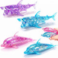 4 Pack Glitter Shark Sugar Stress Ball, Soft Dolphin Squeeze Sensory Balls for Adults Anxiety Relief, Pink Blue Kawaii Animals Stress Gifts for Ocean Party Favors