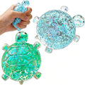 Glitter Turtle Squishies, Cute Soft Relaxing Stress Relief Squeezes, Colorful Turtle Stress Balls Gifts for Office Desk Suitable for Adult Use in Offices and Homes 2 Pack（Blue + Green）